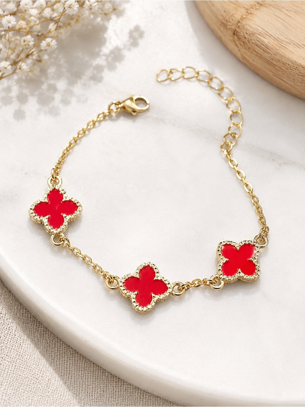 Gold Bracelet with Red Clover Accents